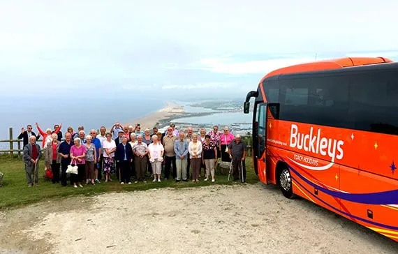 Social-Clubs-Groups-image-min social club stood in front of a buckleys private hire coach